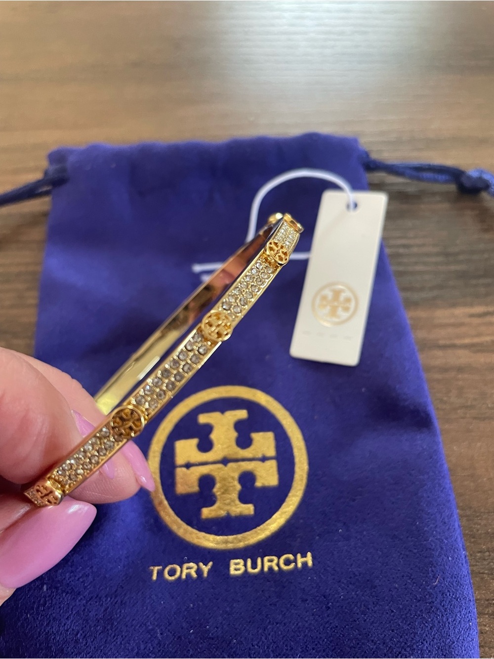 Tory Burch Gold Crystal Logo Bangle with Purple Pouch